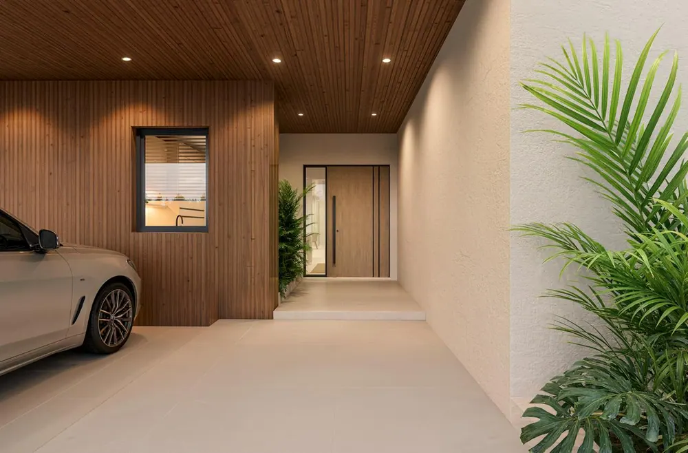 Covered carport and entry breezeway with wood-slat ceiling